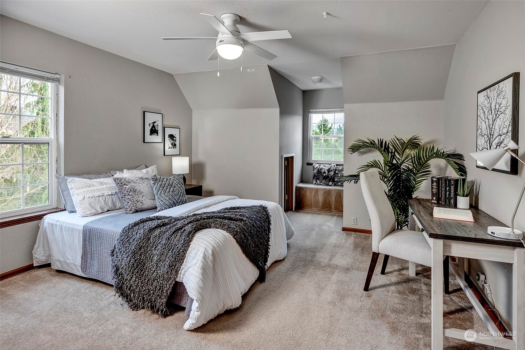 5300 Northeast 16th Street Renton, WA 98059 - Photo 24 of 38 a bedroom with a bed and a potted plant
