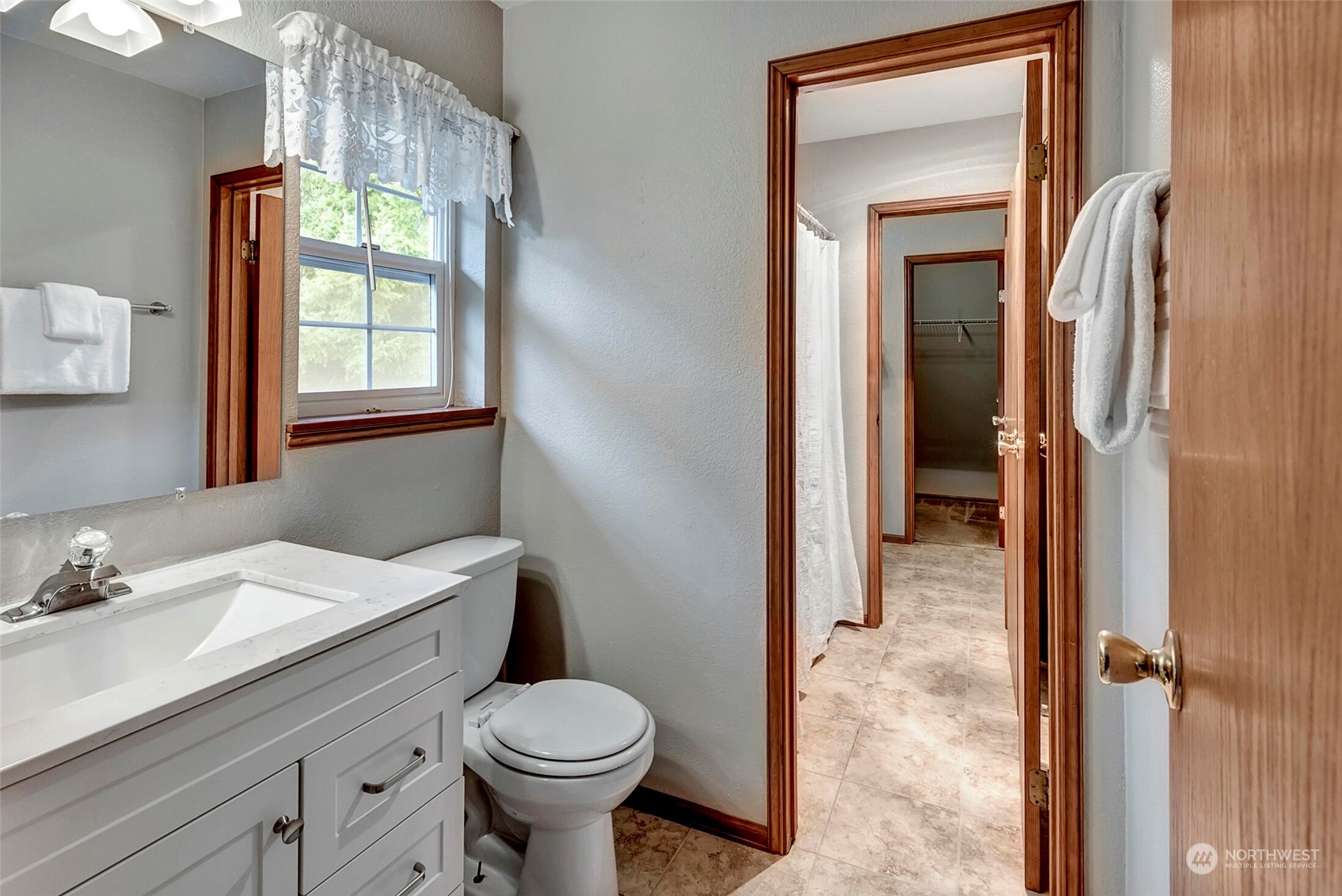 5300 Northeast 16th Street Renton, WA 98059 - Photo 25 of 38 a bathroom with a sink toilet and shower