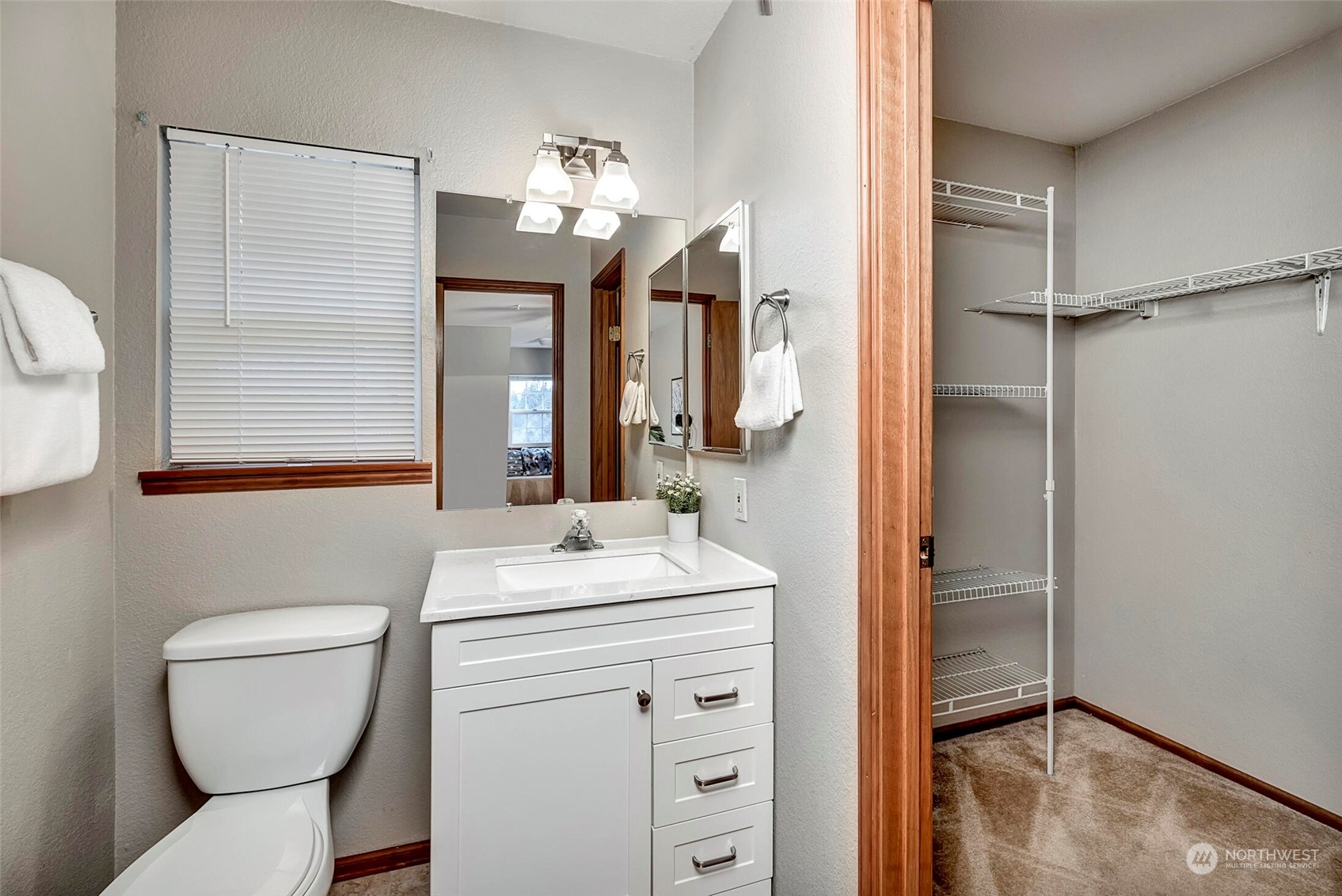 5300 Northeast 16th Street Renton, WA 98059 - Photo 29 of 38 a bathroom with a toilet sink and mirror