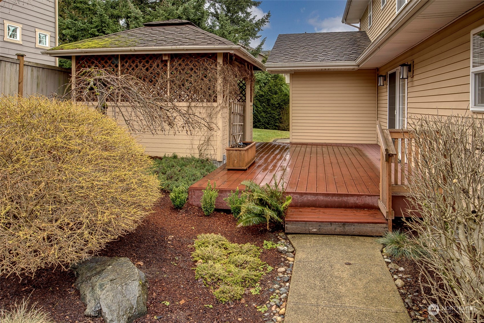 5300 Northeast 16th Street Renton, WA 98059 - Photo 32 of 38 a front view of a house with a garden