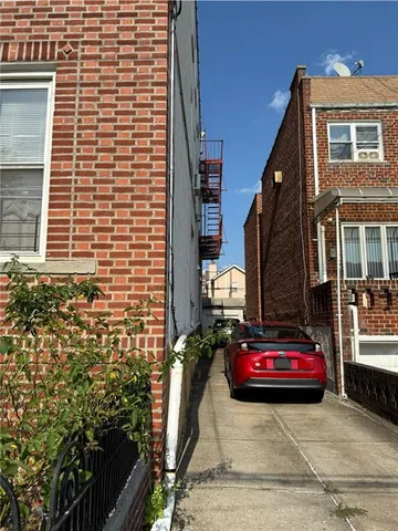 a front view of a house with parking