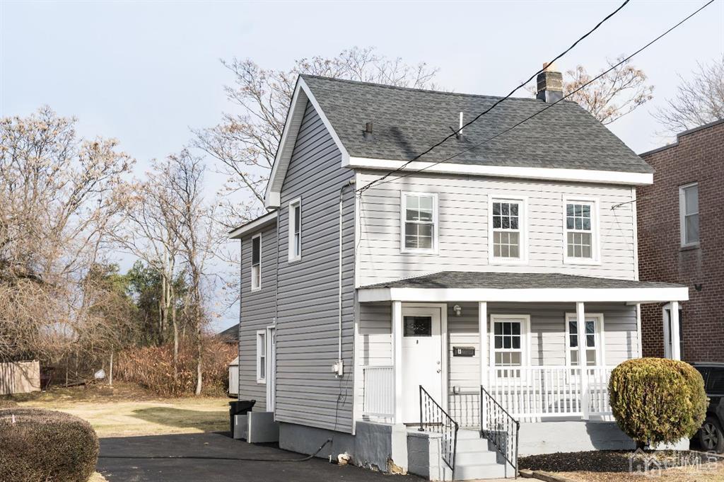 8 Main Street Matawan, NJ 07747 - Photo 1 of 36 a front view of a house with parking space