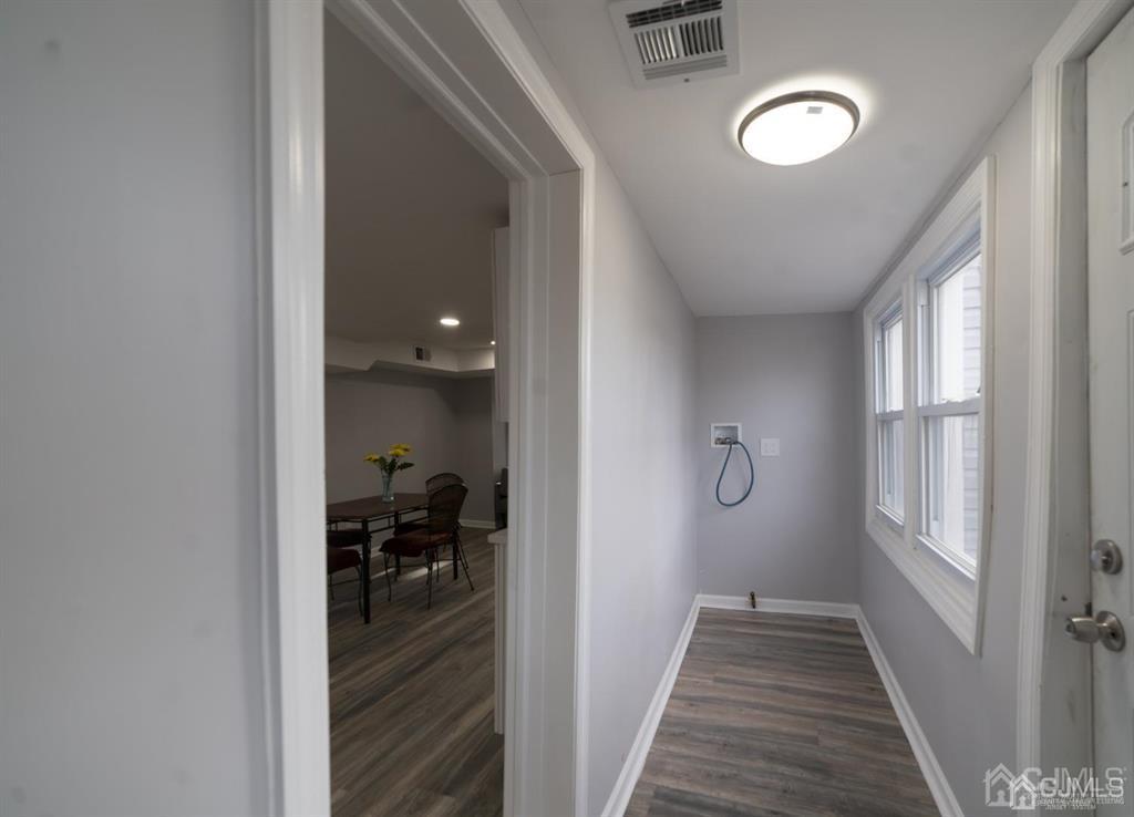 8 Main Street Matawan, NJ 07747 - Photo 16 of 36 a view of a hallway and a livingroom with furniture