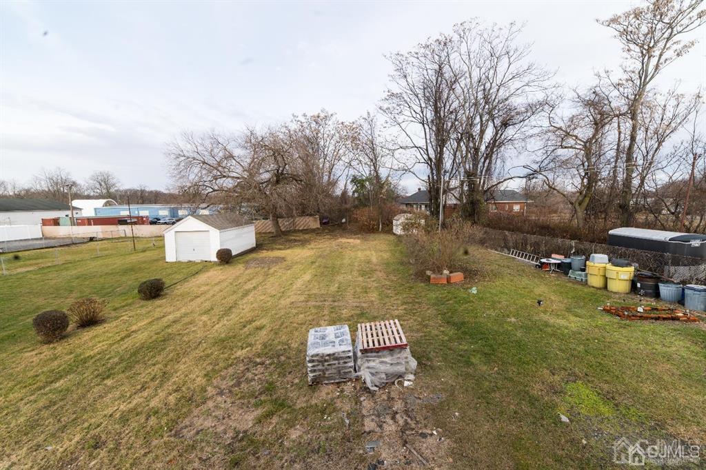 8 Main Street Matawan, NJ 07747 - Photo 24 of 36 a view of a swimming pool with a yard