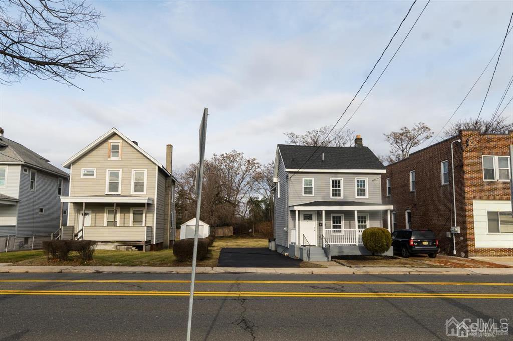 8 Main Street Matawan, NJ 07747 - Photo 26 of 36 a front view of a building with street view