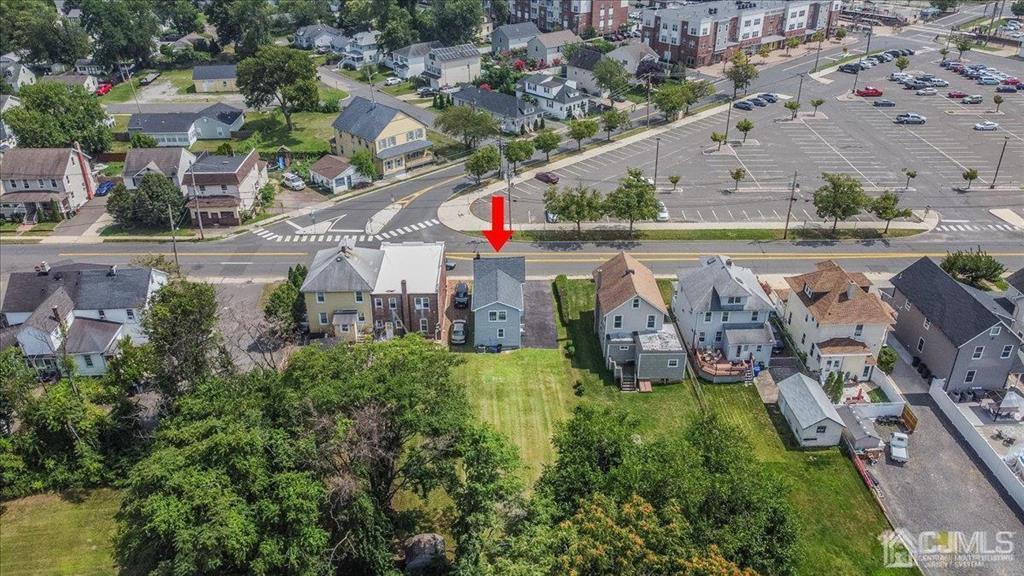 8 Main Street Matawan, NJ 07747 - Photo 31 of 36 an aerial view of multiple houses with yard