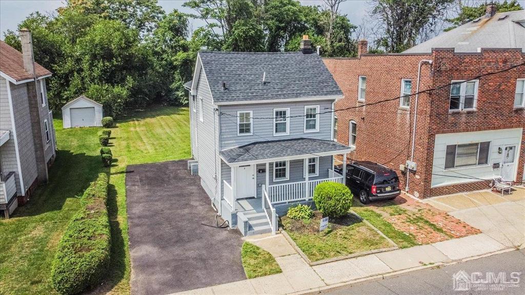 8 Main Street Matawan, NJ 07747 - Photo 36 of 36 an aerial view of a house with a yard table and chairs