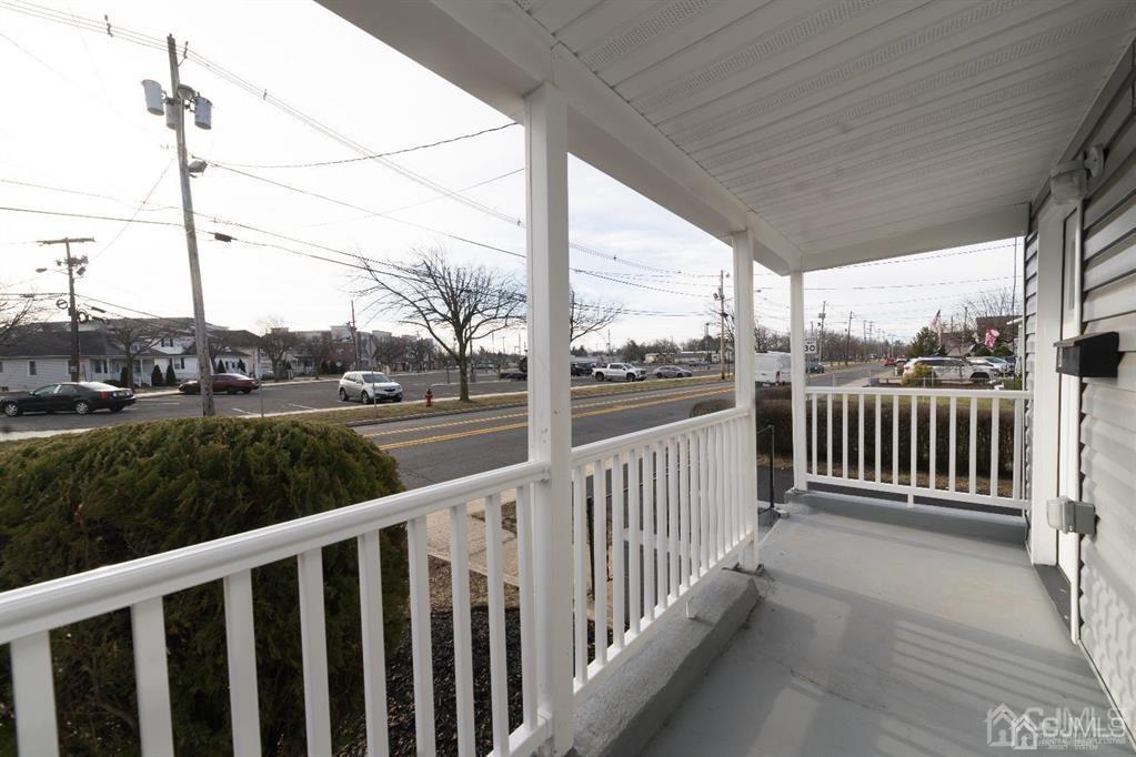 8 Main Street Matawan, NJ 07747 - Photo 5 of 36 a view of a porch with a yard