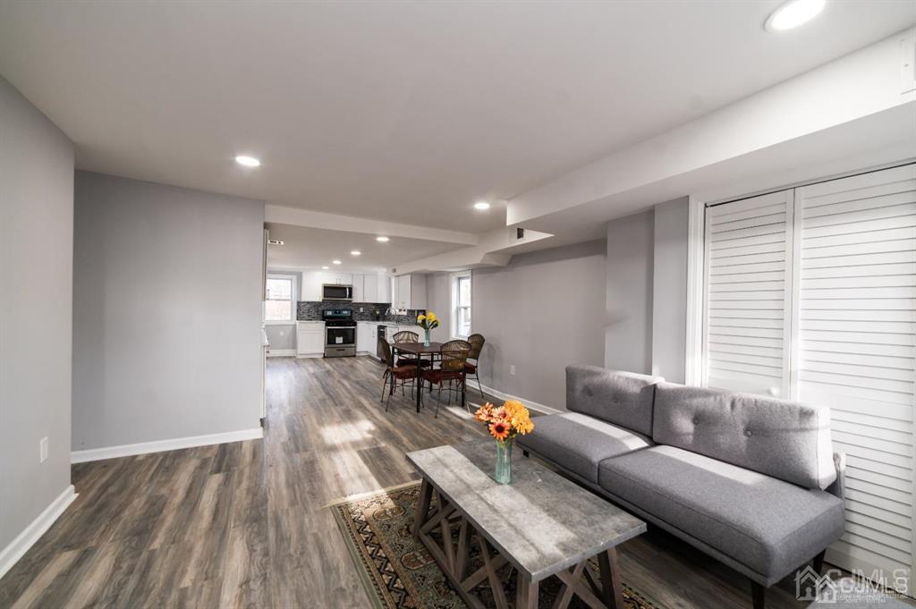 8 Main Street Matawan, NJ 07747 - Photo 6 of 36 a living room with furniture and a wooden floor