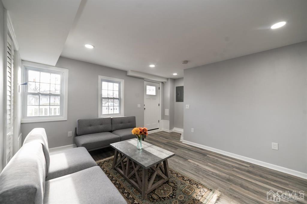 8 Main Street Matawan, NJ 07747 - Photo 7 of 36 a living room with furniture and a window