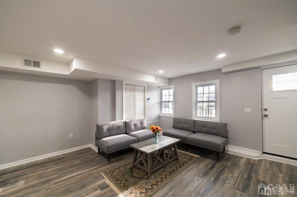 8 Main Street Matawan, NJ 07747 - Photo 8 of 36 a living room with furniture and wooden floor