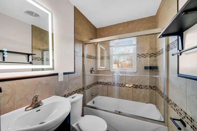 a bathroom with a sink and a bathtub