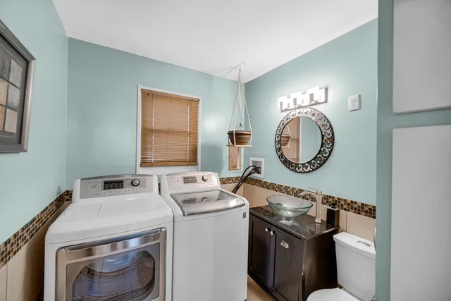 a kitchen with a stove and a sink