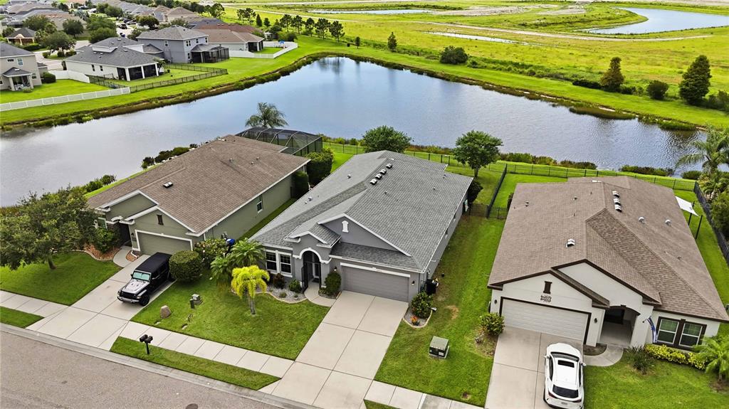 10920 79th Street East Parrish, FL 34219 - Photo 57 of 73 an aerial view of a house with a garden and pool