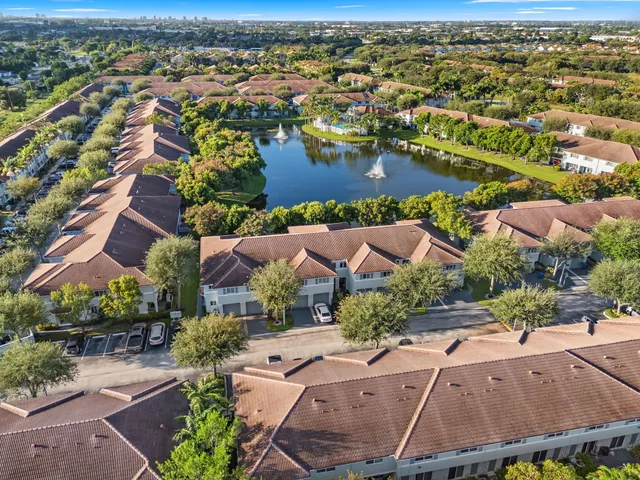 a view of a lake with a house in the background