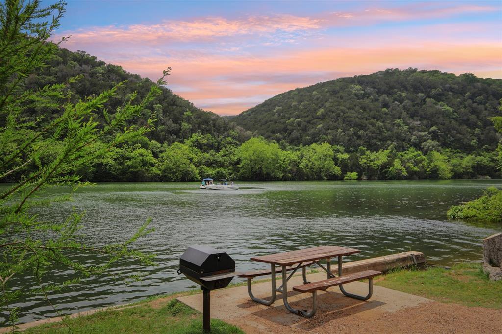 12610 River Bend Austin, TX 78732 - Photo 3 of 19 a view of lake with green space and mountain view