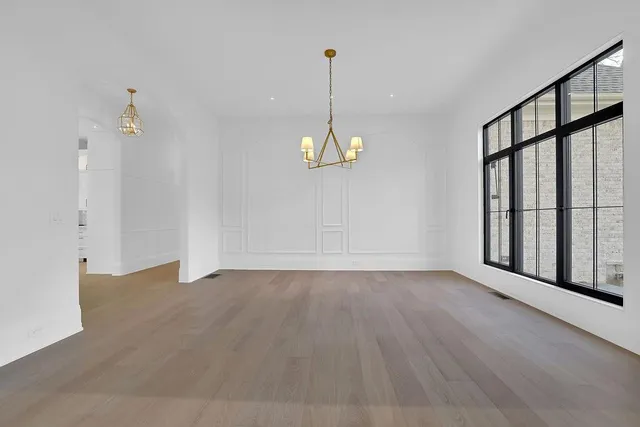 a white tub sitting next to a window