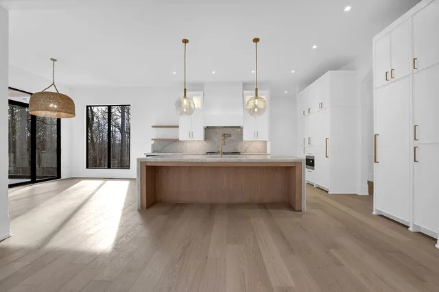 a black and white photo of a living room