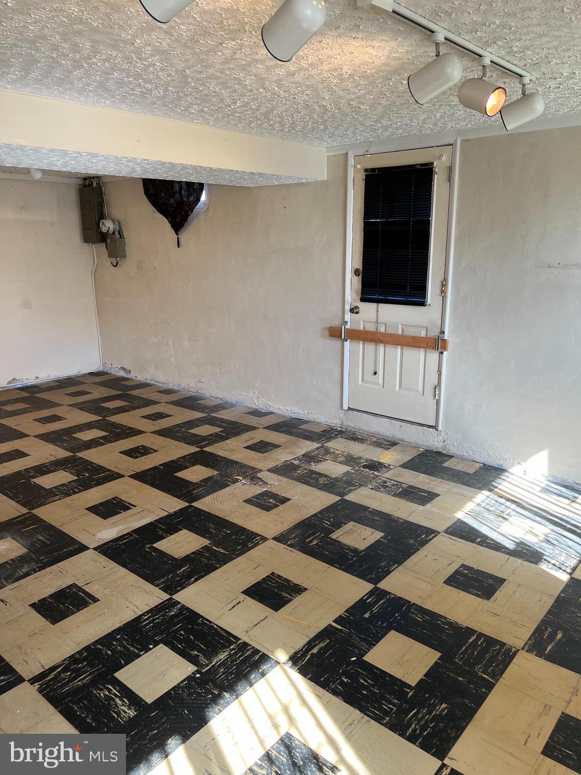 3501 Sedgemoor Road Baltimore, MD 21207 - Photo 23 of 25 Family room with exterior exit