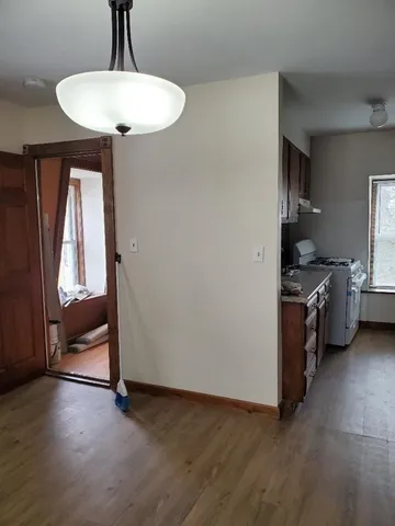 a kitchen with stainless steel appliances a refrigerator and a sink