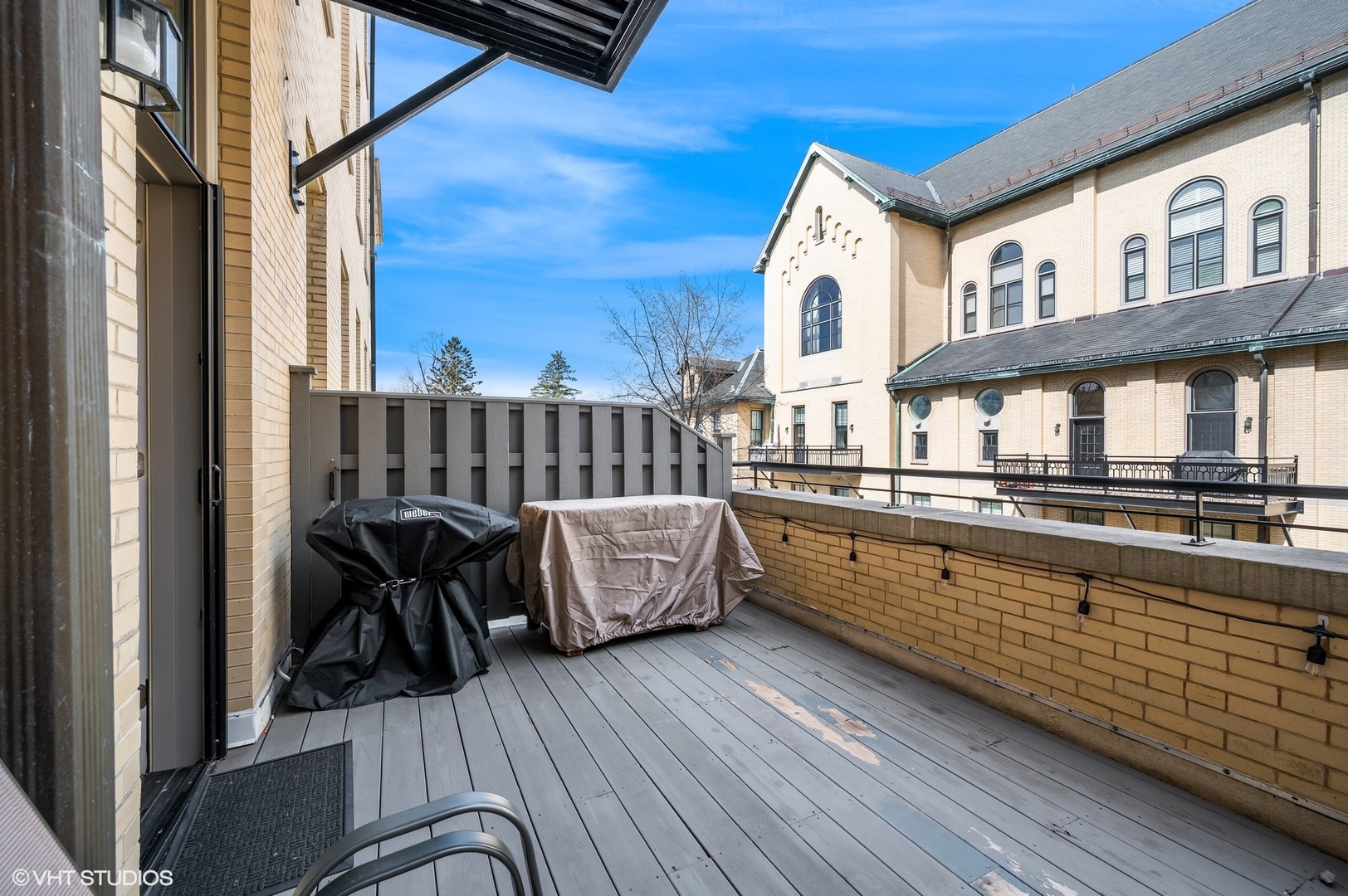 1041 Ridge Road, Unit 217 Wilmette, IL 60091 - Photo 15 of 19 a view of a chair and tables in the balcony