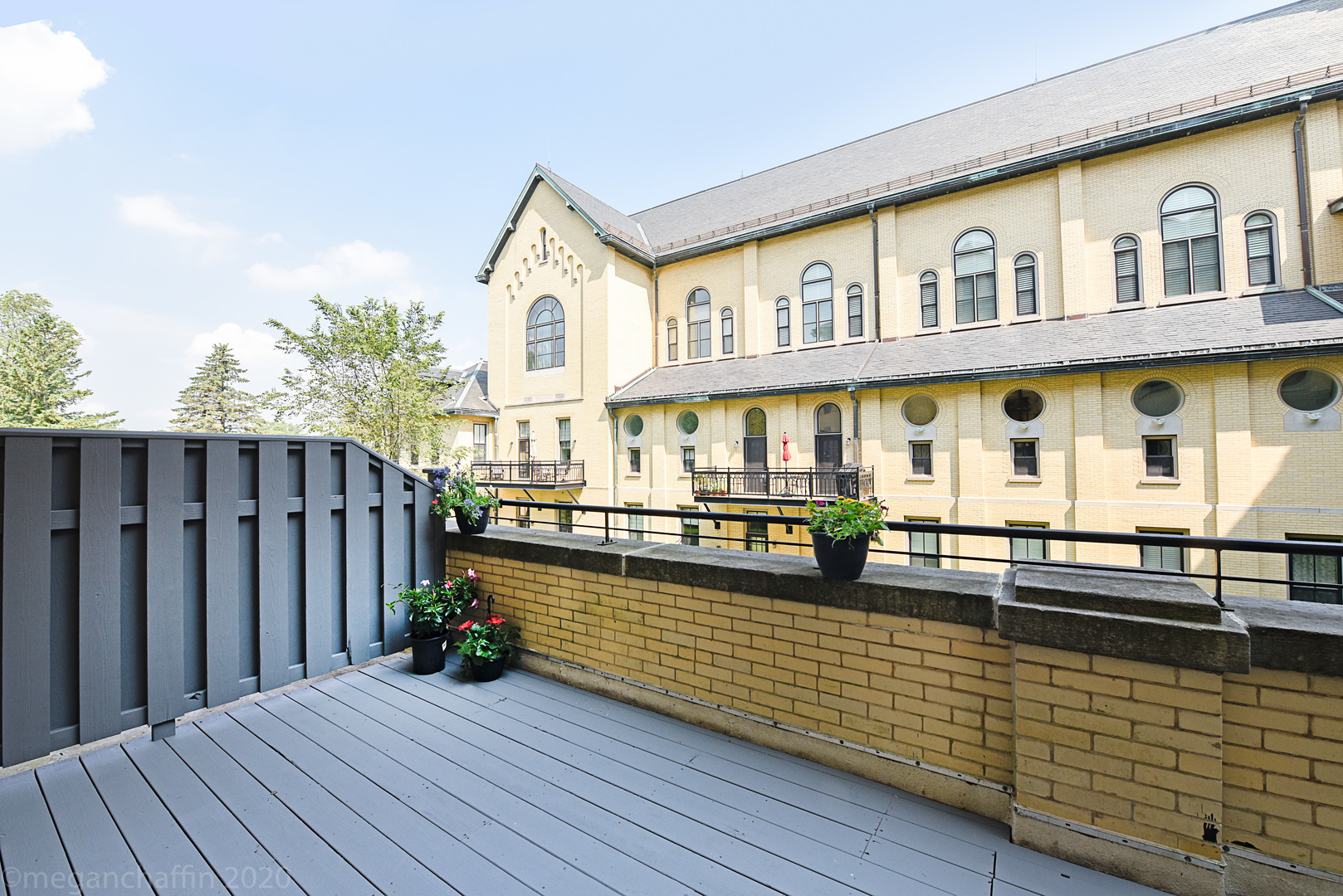 1041 Ridge Road, Unit 217 Wilmette, IL 60091 - Photo 3 of 19 a view of a house with wooden deck