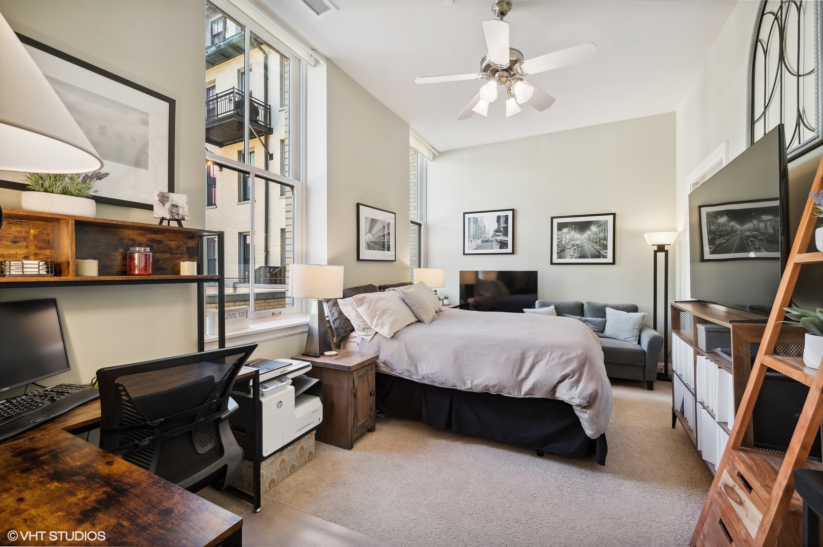 1041 Ridge Road, Unit 217 Wilmette, IL 60091 - Photo 8 of 19 a spacious bedroom with a bed and a chandelier