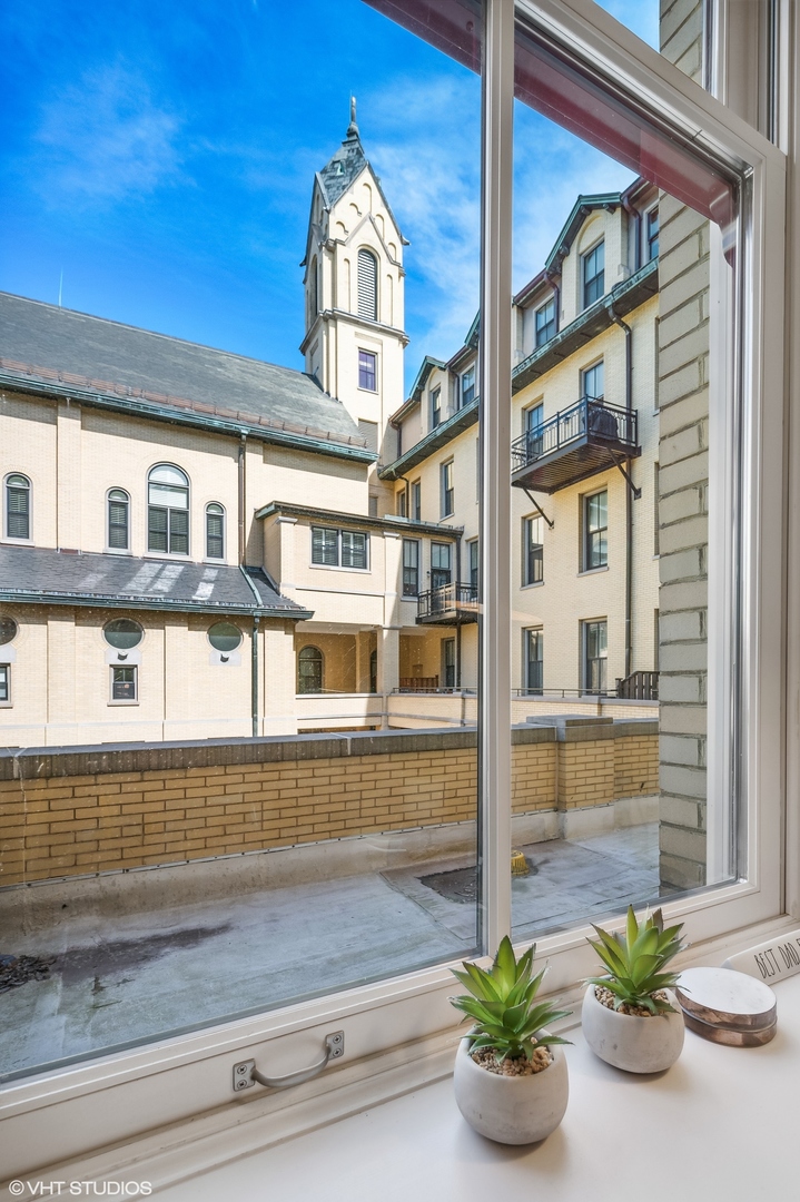 1041 Ridge Road, Unit 217 Wilmette, IL 60091 - Photo 10 of 19 a view of a house with a potted plant