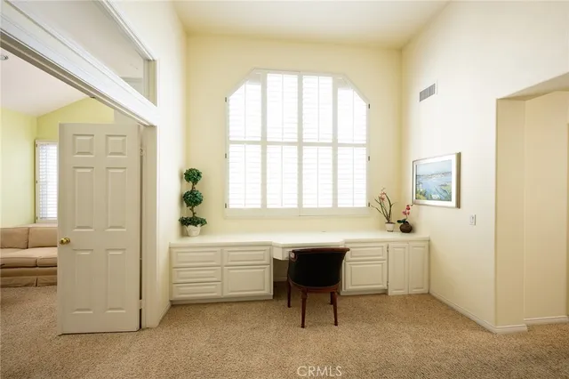 a bathroom with a sink a bathtub and a window
