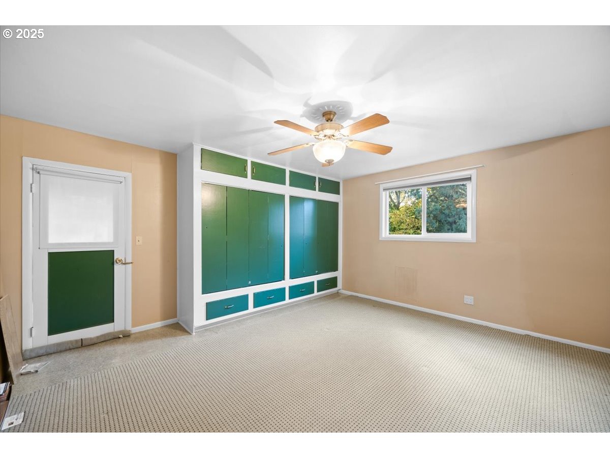 939 Buckhorn Road Roseburg, OR 97470 - Photo 13 of 35 a view of an empty room with a window
