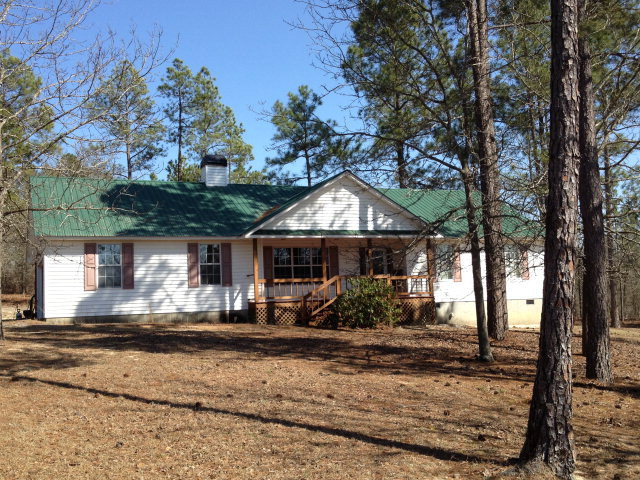 863 Old Barnwell Road Aiken, SC 29803 - Photo 1 of 1 a front view of a house with garden