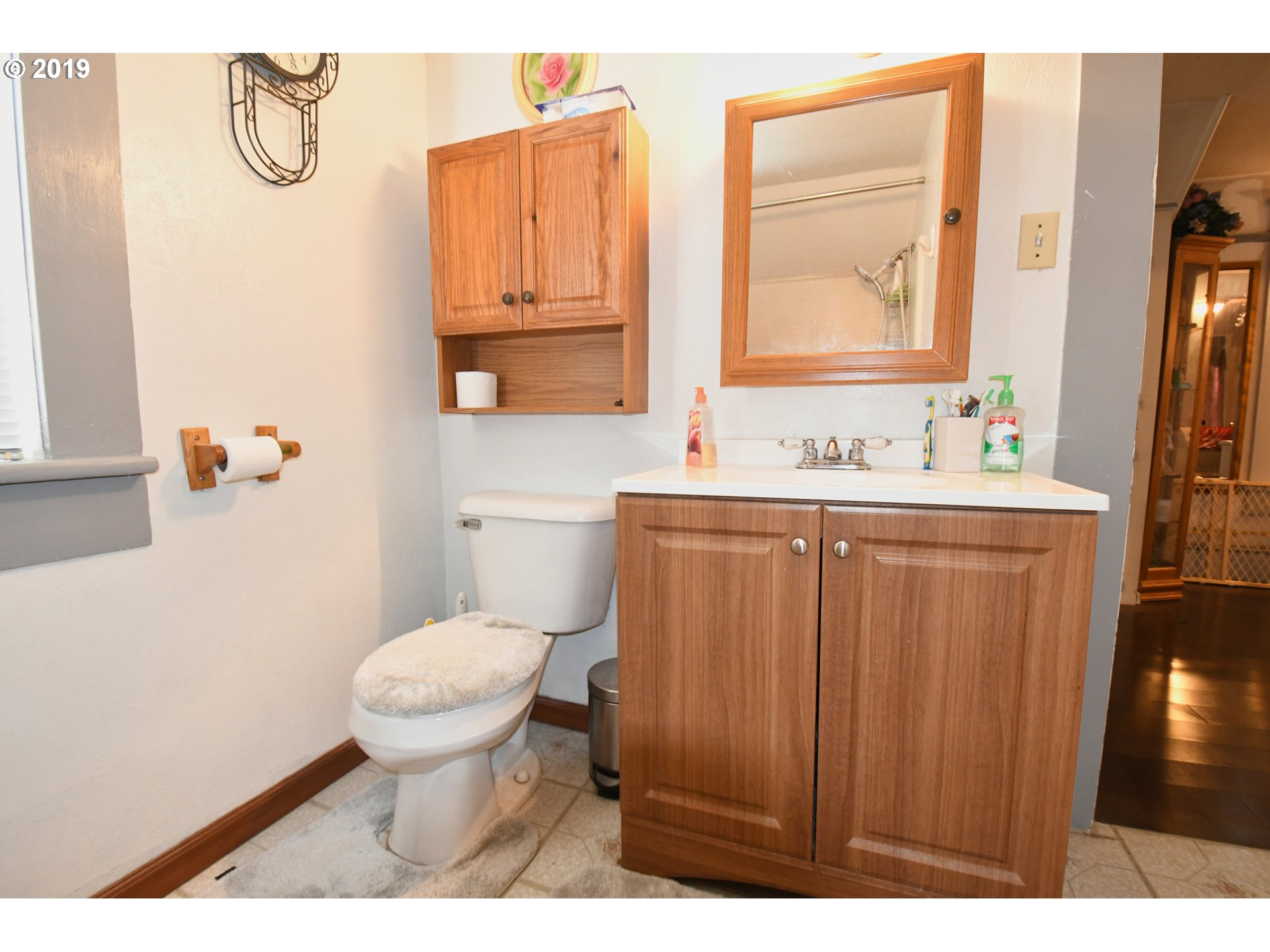 324 Southwest 2nd Street Pendleton, OR 97801 - Photo 30 of 32 a bathroom with a sink toilet and mirror