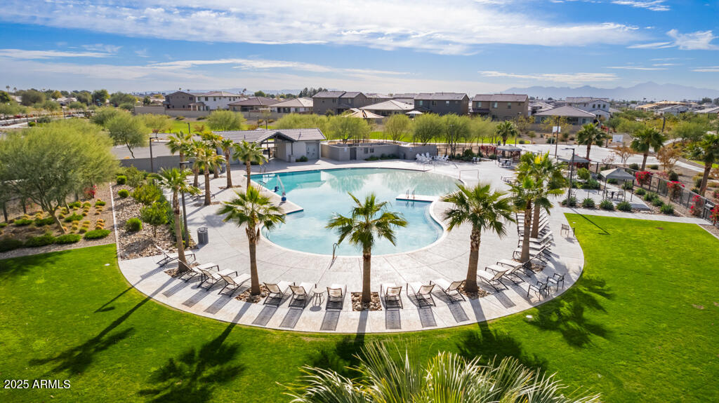 8875 West Colter Street Glendale, AZ 85305 - Photo 9 of 13 a view of a swimming pool with a lake view