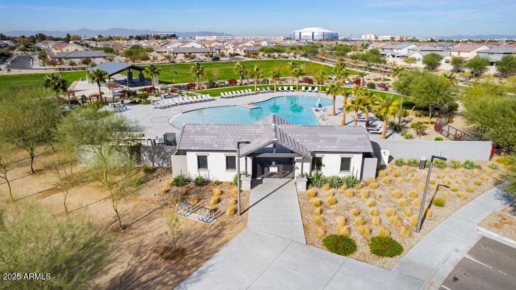 8875 West Colter Street Glendale, AZ 85305 - Photo 11 of 13 an aerial view of residential houses with outdoor space and swimming pool
