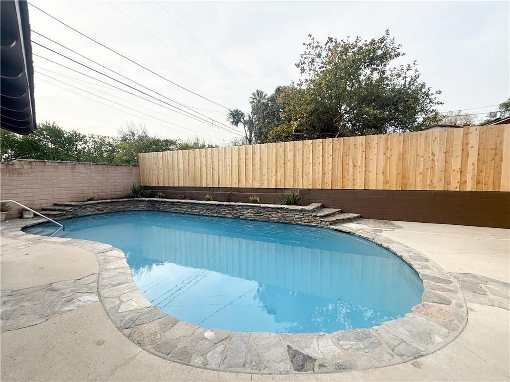 1625 Elevado Avenue Arcadia, CA 91006 - Photo 11 of 12 a view of a swimming pool with a yard