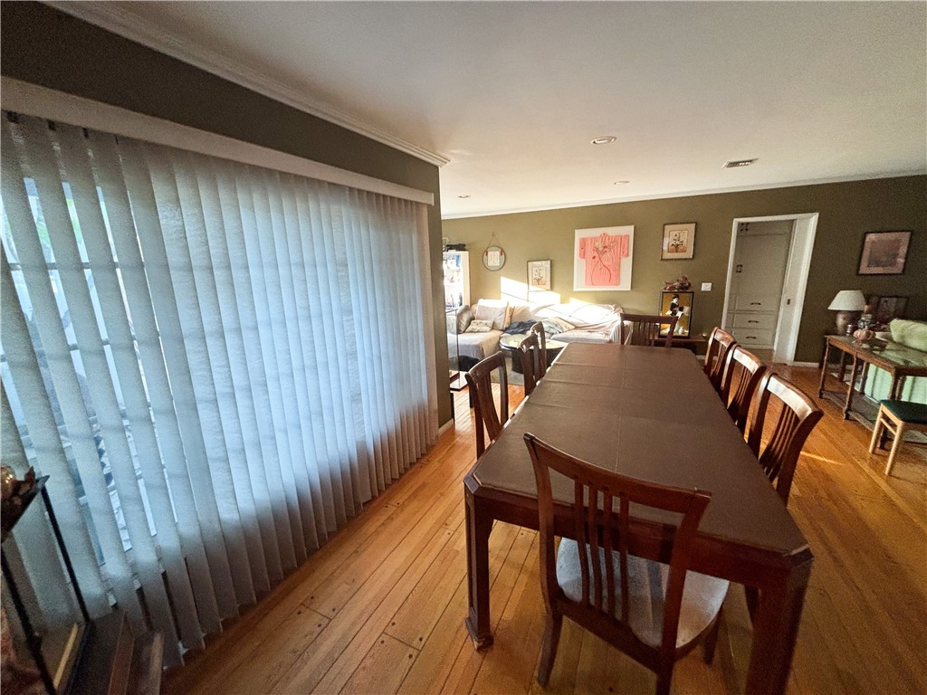 1625 Elevado Avenue Arcadia, CA 91006 - Photo 7 of 12 a view of a a dining room with furniture window and wooden floor