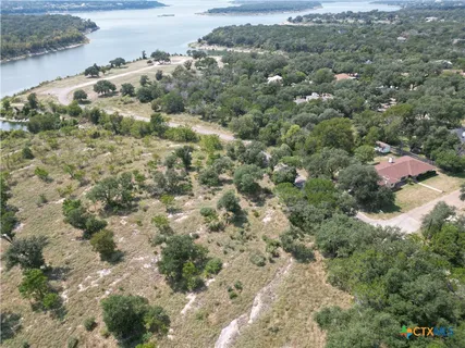 a view of a lake from a yard