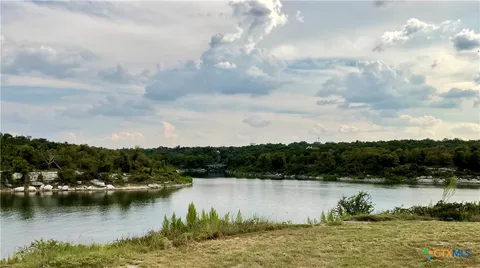 a white house that has wooden floor