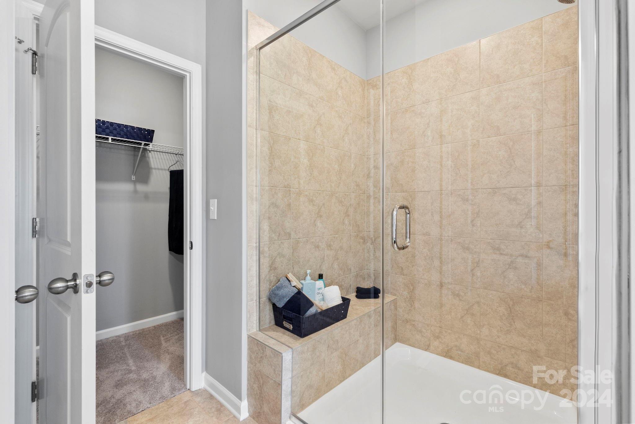 7906 Nelson Road Mint Hill, NC 28227 - Photo 14 of 29 a bathroom with a shower