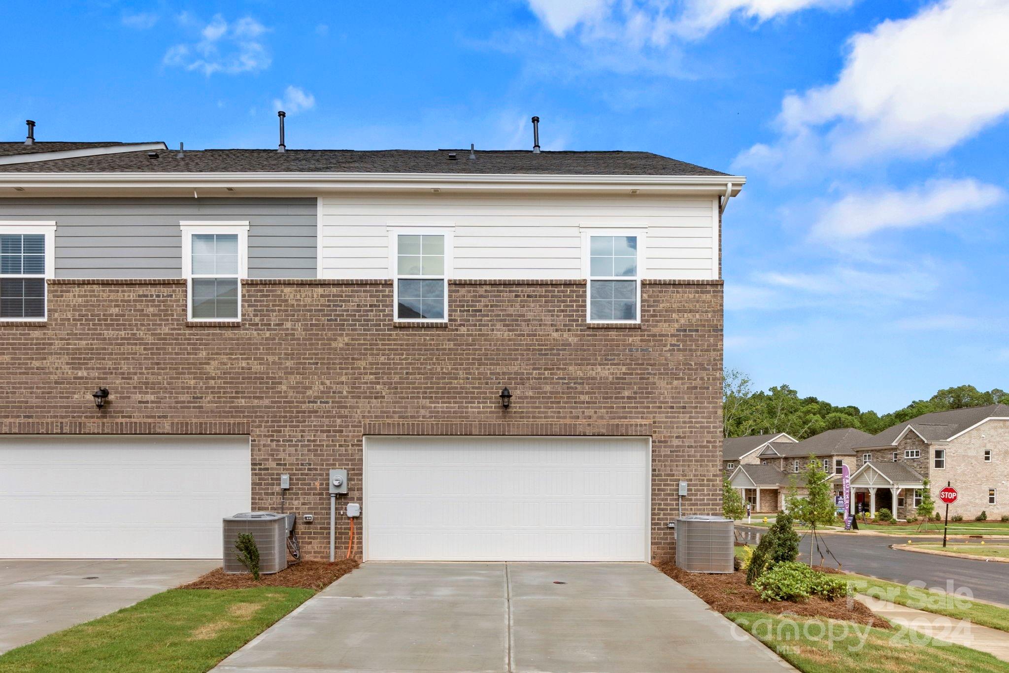 7906 Nelson Road Mint Hill, NC 28227 - Photo 19 of 29 a front view of a house with a yard