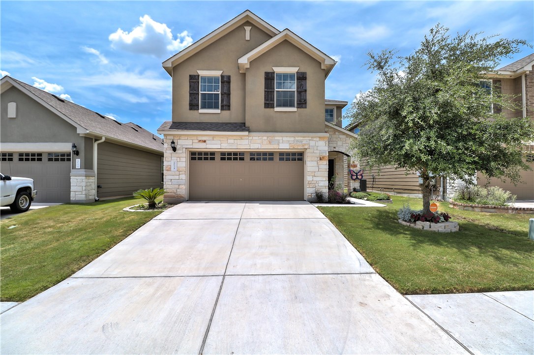 10124 Wading Pool Path Austin, TX 78748 - Photo 1 of 1 a front view of a house with a yard and trees