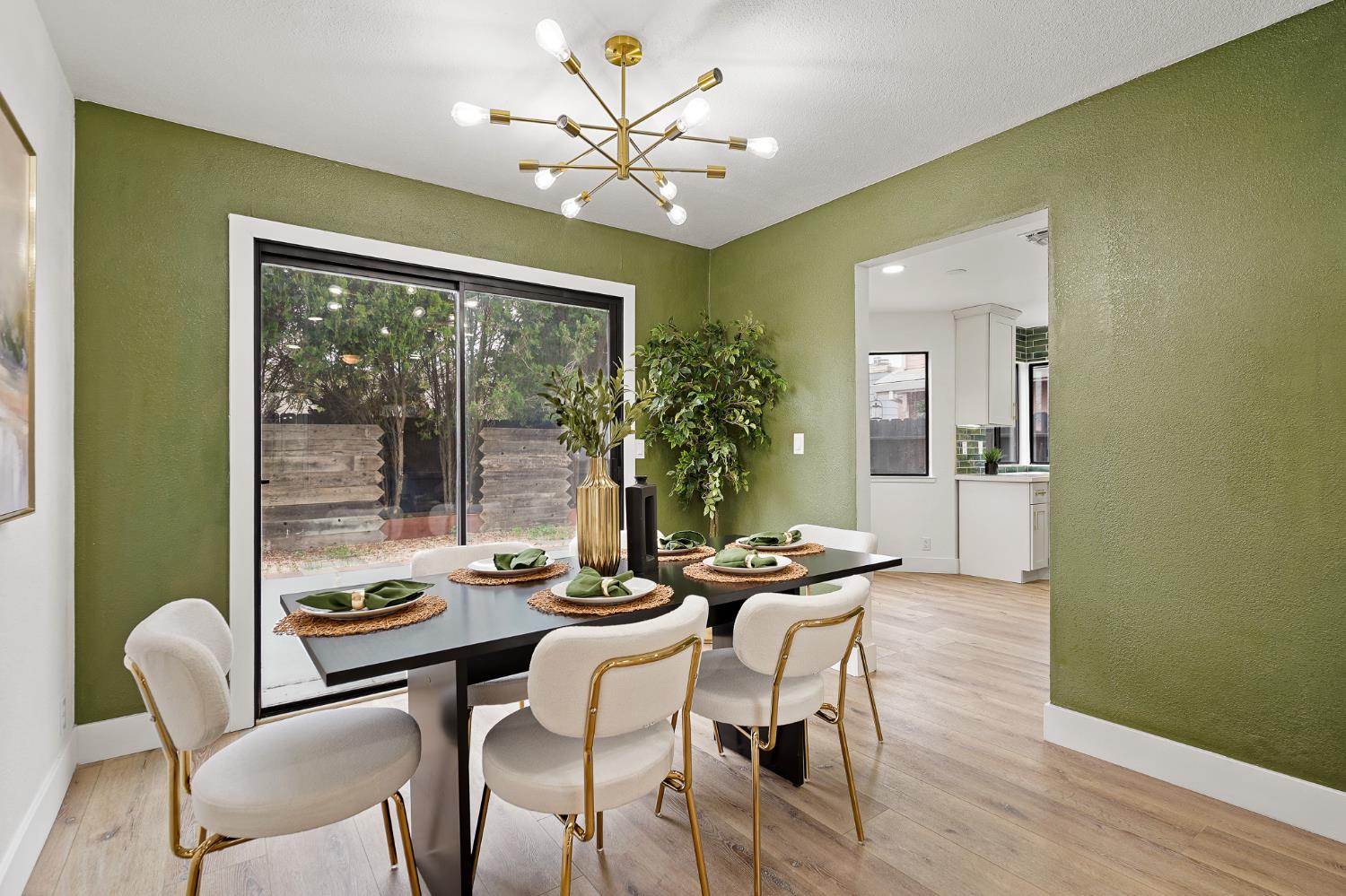335 West Clover Road Tracy, CA 95376 - Photo 12 of 49 a view of a dining room with furniture window and outside view
