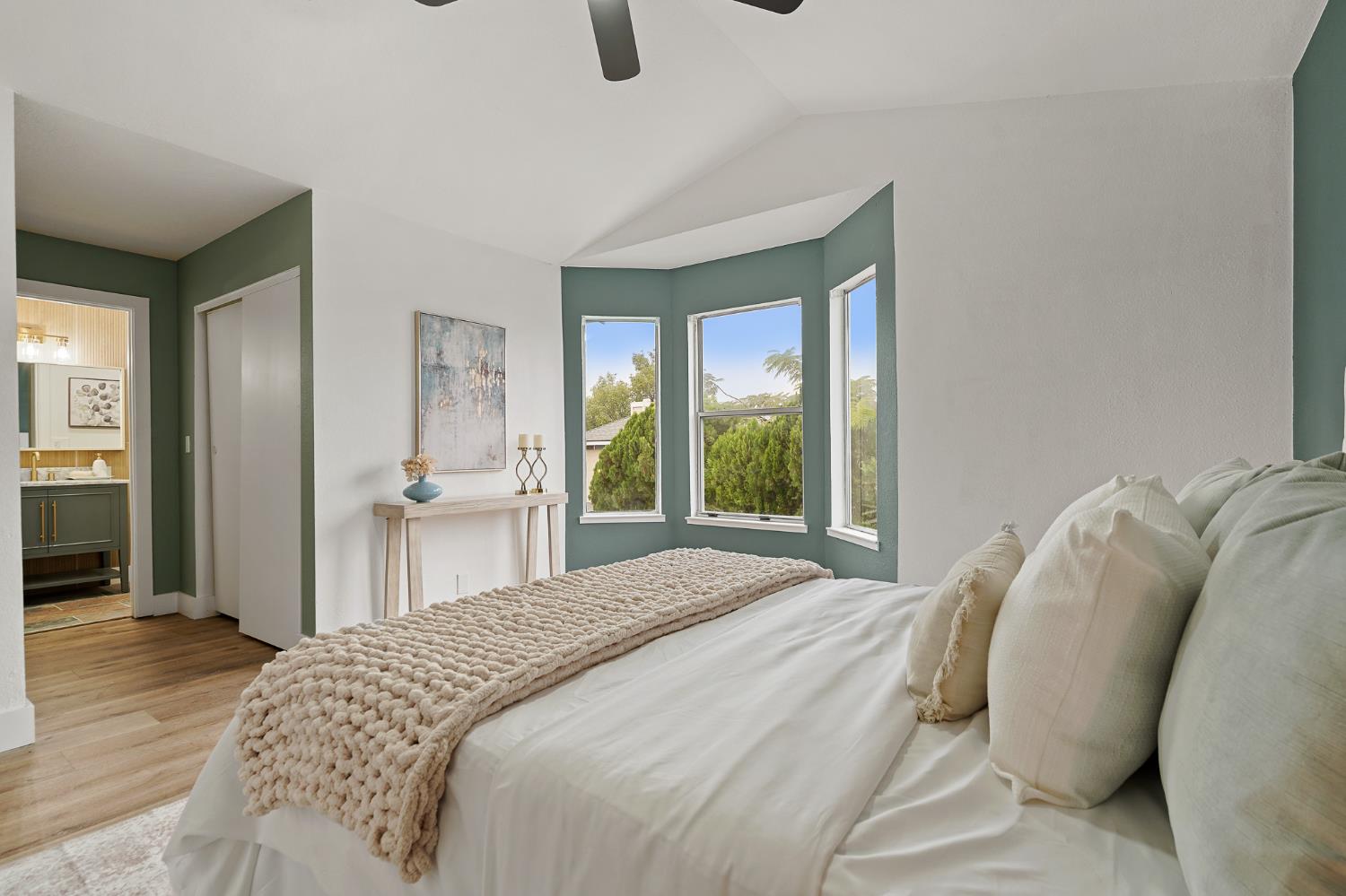 335 West Clover Road Tracy, CA 95376 - Photo 27 of 49 a bedroom with a bed and a large window