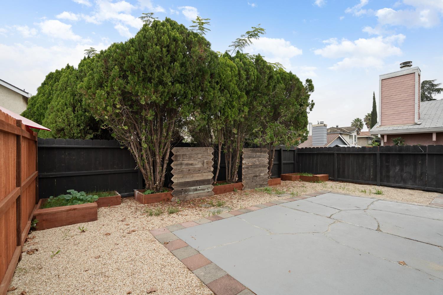 335 West Clover Road Tracy, CA 95376 - Photo 36 of 49 a view of a backyard of the house