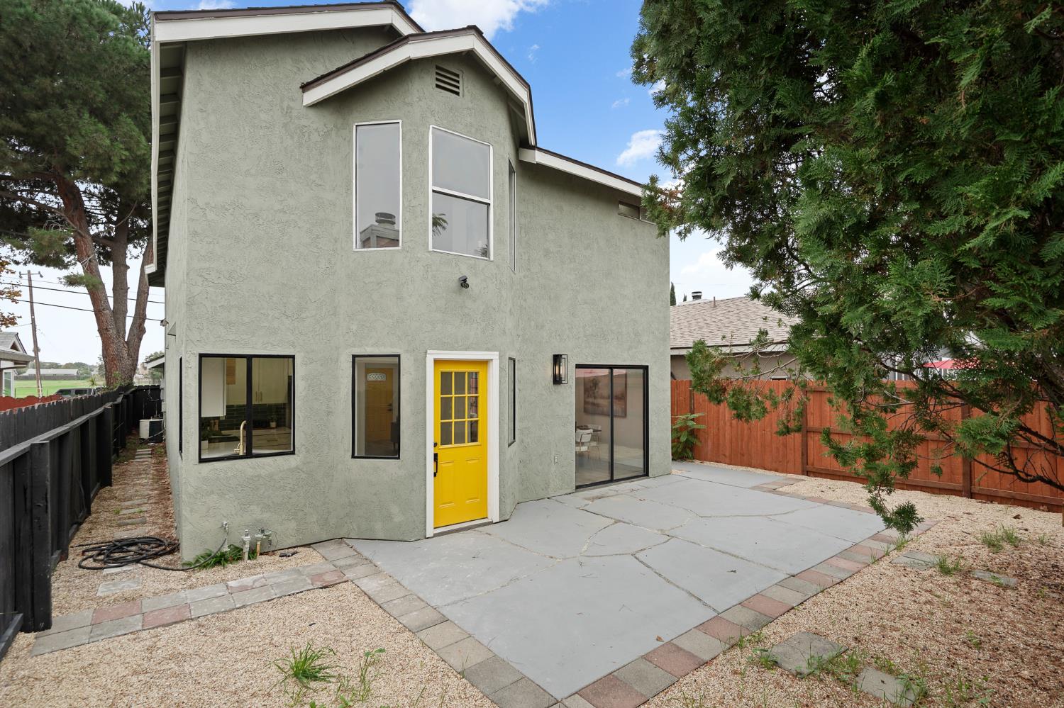 335 West Clover Road Tracy, CA 95376 - Photo 38 of 49 a front view of a house with a yard