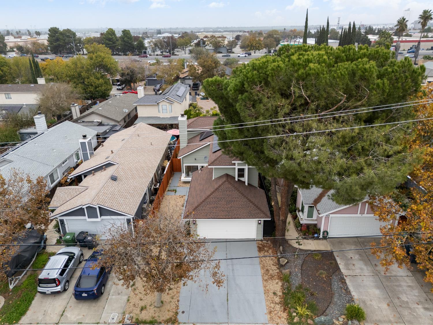 335 West Clover Road Tracy, CA 95376 - Photo 44 of 49 an aerial view of a house with a yard