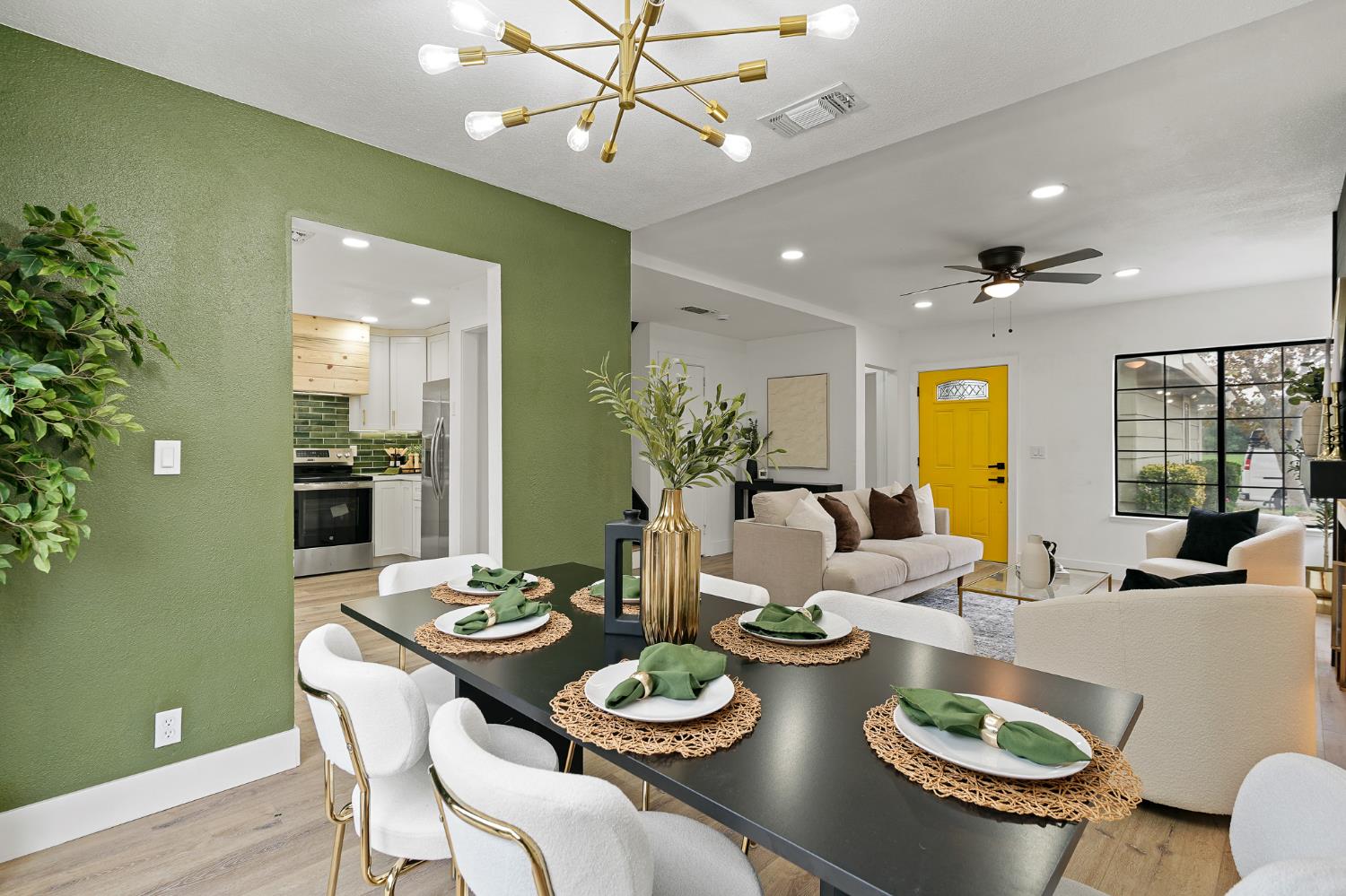 335 West Clover Road Tracy, CA 95376 - Photo 10 of 49 a dining room with furniture and a wooden floor