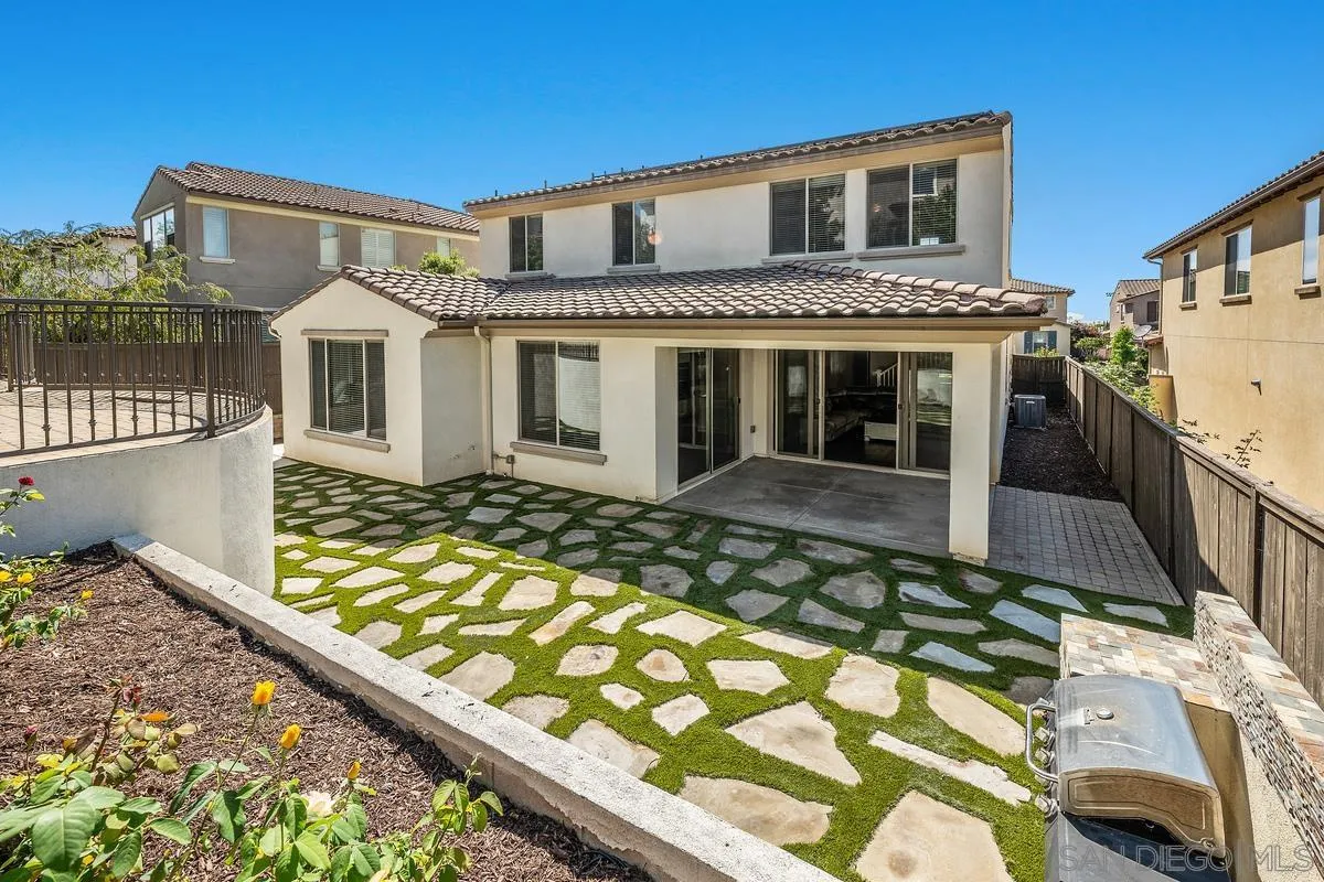 529 Adobe Estates Drive Vista, CA 92083 - Photo 18 of 39 a front view of a house with large windows