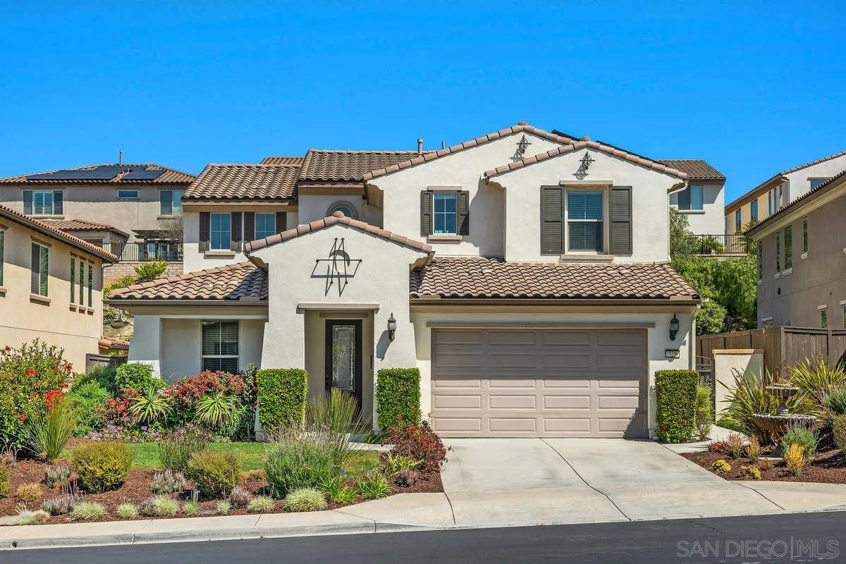 529 Adobe Estates Drive Vista, CA 92083 - Photo 34 of 39 a front view of a house with a garden