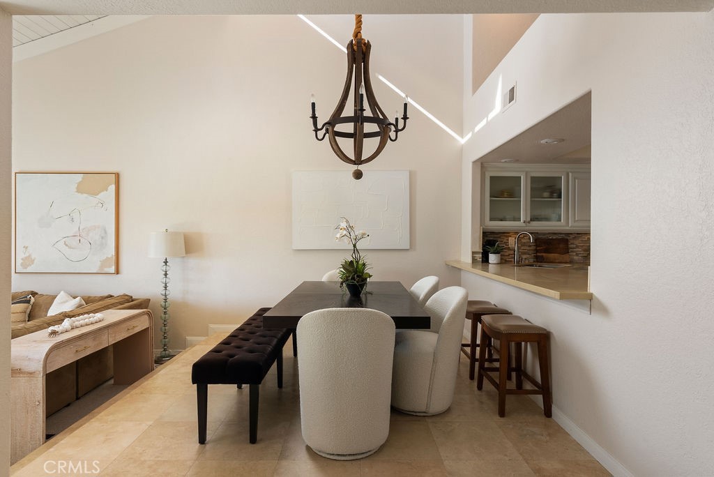 23274 Atlantis Way Dana Point, CA 92629 - Photo 15 of 53 a dining room with furniture and window